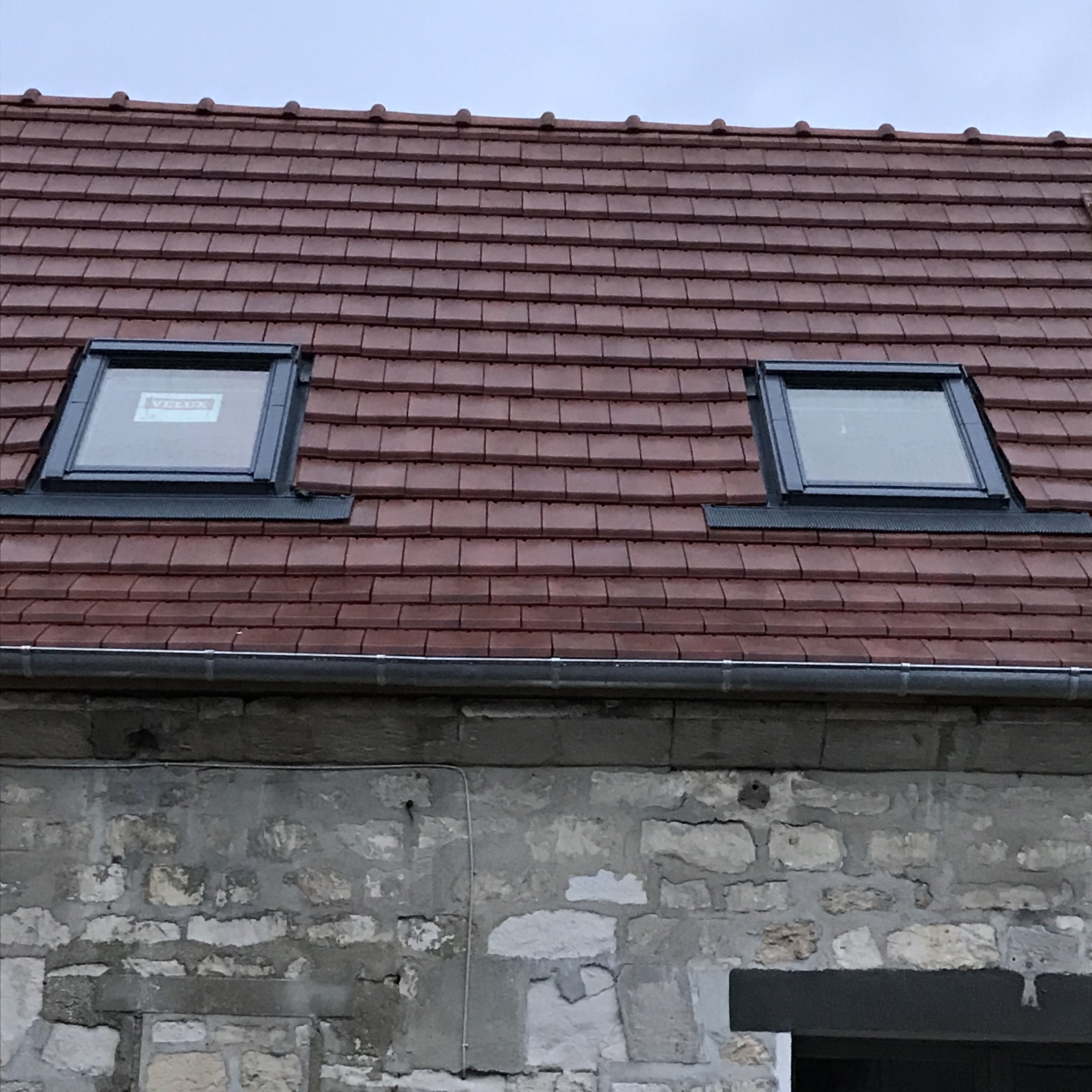 Couvreur oise pose velux toiture apres