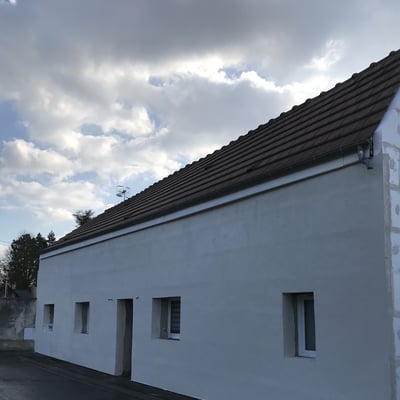 Ravalement facade enduit blanc apres